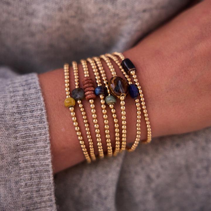 bolletjes armband 3 mm met bruin/blauwe bedel